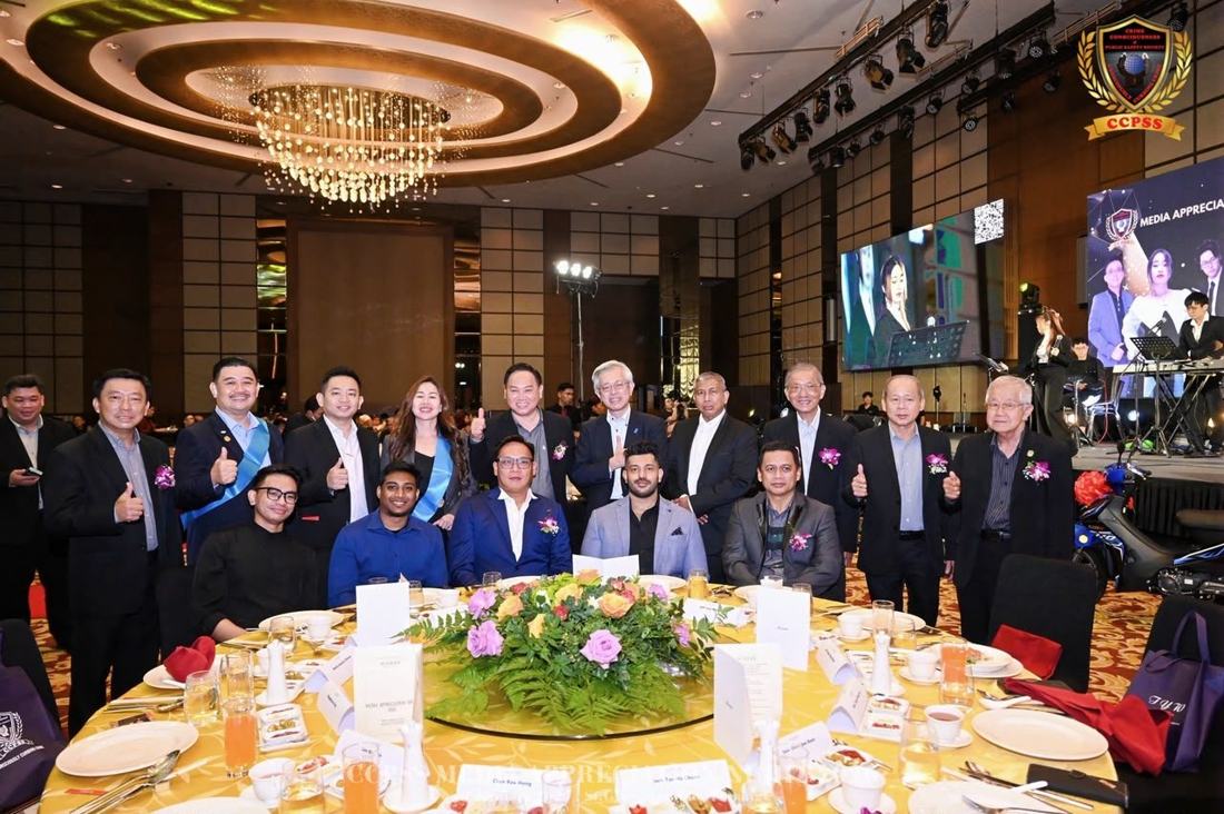 Group photo at a media appreciation dinner